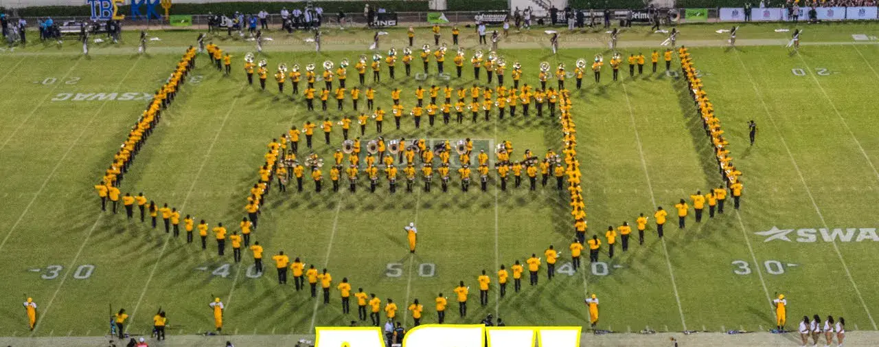 The Mighty Marching Hornets in their shield formation across midfield
